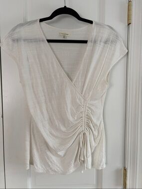 White V neck top.